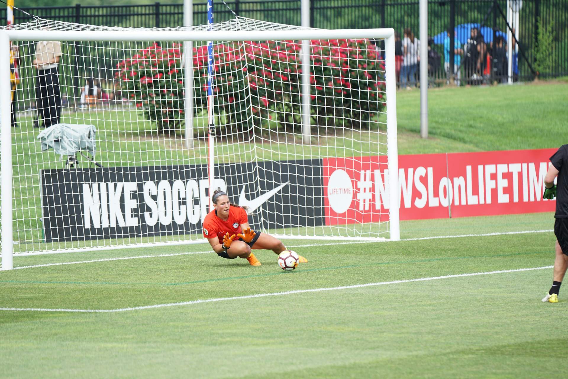 Goalkeeper making a save during soccer match